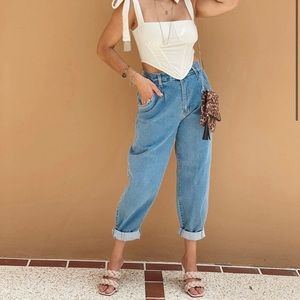 Mom Jeans. Runs normal. Doesn’t stretch. New with tags, never worn